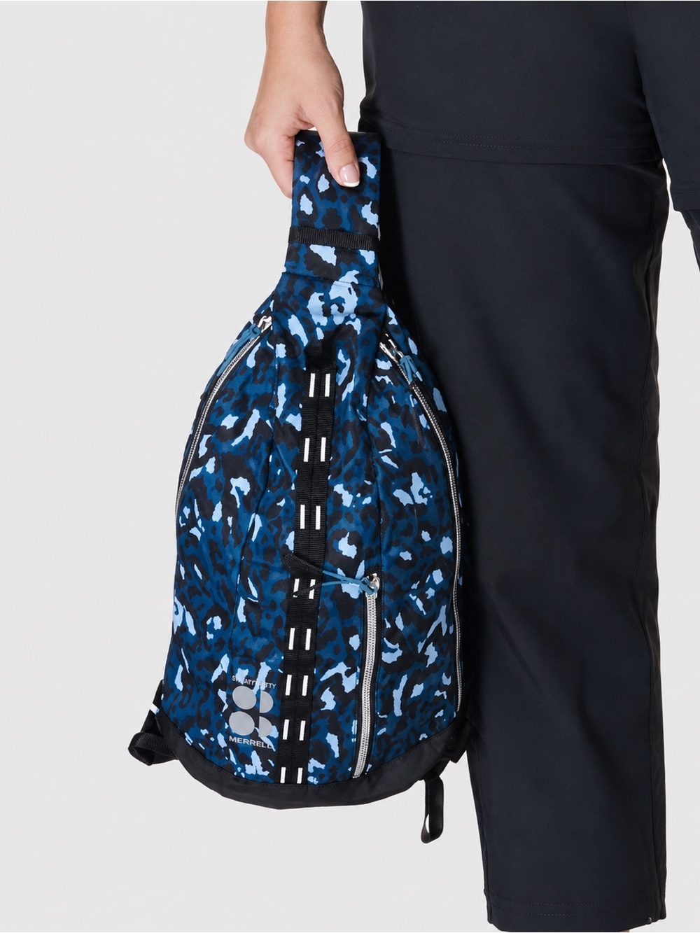Sweaty Betty x Merrell leopard print backpack/ cross body bag
